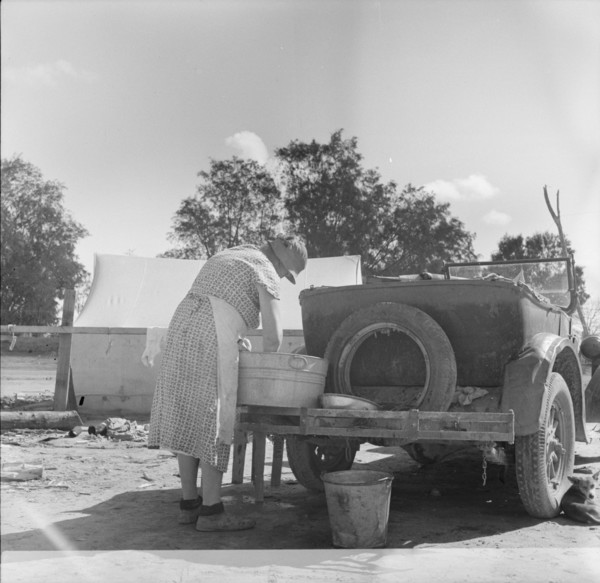Blue Monday in a California migratory camp, 1936. Creator: Dorothea Lange.