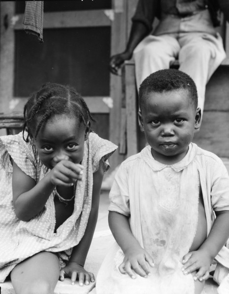 Children of evicted sharecropper, now living on Sherwood Eddy cooperative plantation, 1936. Creator: Dorothea Lange.