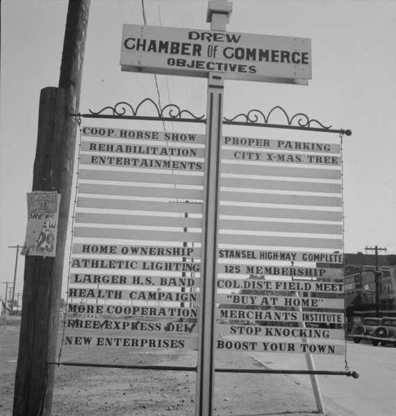 Chamber of Commerce sign, Drew, Mississippi, 1937. Creator: Dorothea Lange.