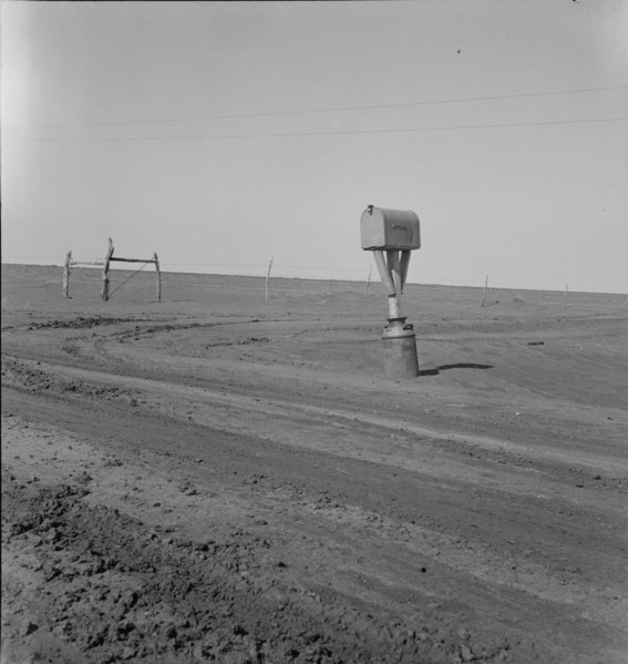 Mailbox in Dust Bowl, Coldwater District, north of Dalhart, Texas, 1938. Creator: Dorothea Lange.