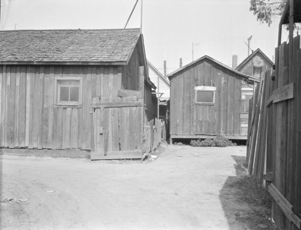 Mexican quarter of Los Angeles, one quarter mile from City Hall, California, 1936. Creator: Dorothea Lange.