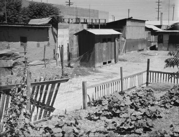 Homes of Mexican field laborers, a street in Brawley, Imperial Valley, California, 1935. Creator: Dorothea Lange.