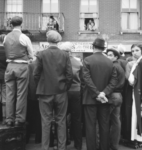 Crowds around post office, Lower East Side, New York, 1936. Creator: Dorothea Lange.