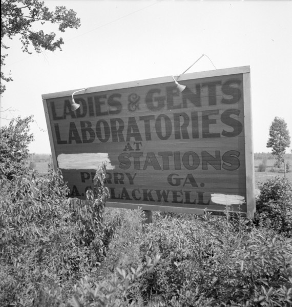 Road sign near Perry, Georgia, 1936. Creator: Dorothea Lange.