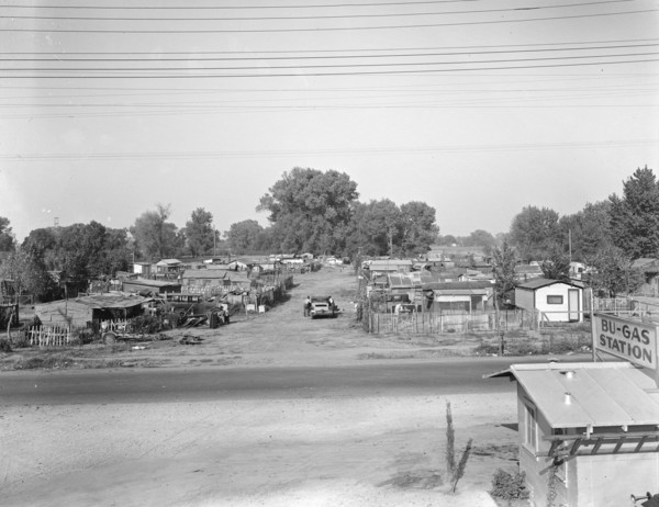 Migrant winter camp on outskirts of Sacramento, California, 1936. Creator: Dorothea Lange.