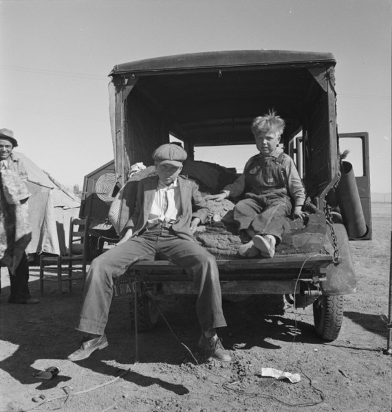 Children of Oklahoma migrants in agricultural workers' camp near Calipatria, California, 1937. Creator: Dorothea Lange.