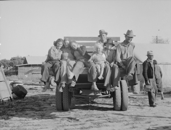 California pea pickers returning to camp..., near Santa Clara, California, 1937. Creator: Dorothea Lange.