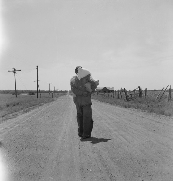 Man going home with relief, near Oil City, Carter County, Oklahoma, 1937. Creator: Dorothea Lange.