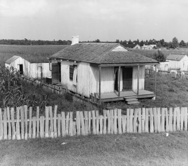 Cabin of sugarcane worker, Bayou La Fourche, Louisiana, 1937. Creator: Dorothea Lange.