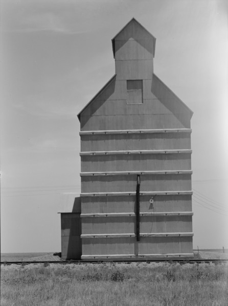 Grain elevator on the Texas Panhandle plains, Everett, Texas, 1938. Creator: Dorothea Lange.