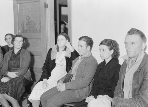 Night meeting in the FSA office, Tulare County, California, 1938. Creator: Dorothea Lange.