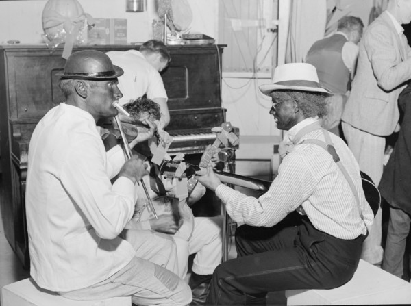 Halloween party at Shafter camp for migrants, California, 1938. Creator: Dorothea Lange.