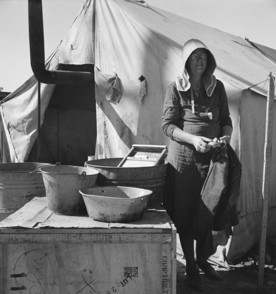 Texas woman in carrot pullers' camp, Imperial Valley, California, 1939. Creator: Dorothea Lange.