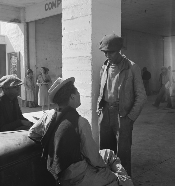 Outside the FSA grant office during the pea harvest, Calipatria, California  1939. Creator: Dorothea Lange.