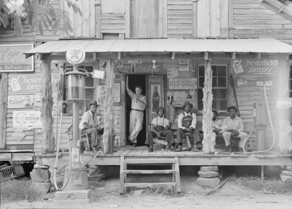 Country store on dirt road, Sunday afternoon, Gordonton, North Carolina, 1939. Creator: Dorothea Lange.