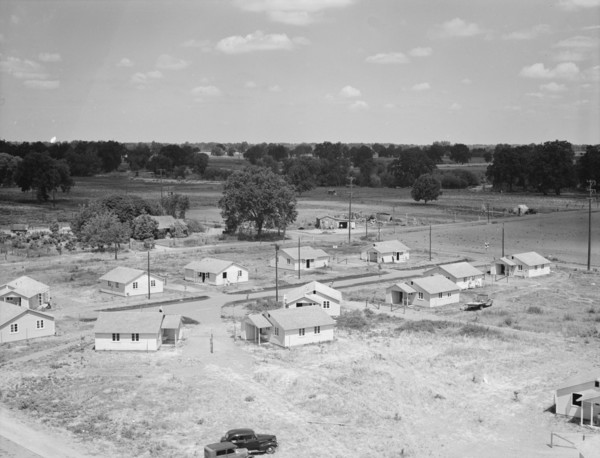 Partially completed homes for agricultural workers..., Farmersville, California, 1939. Creator: Dorothea Lange.