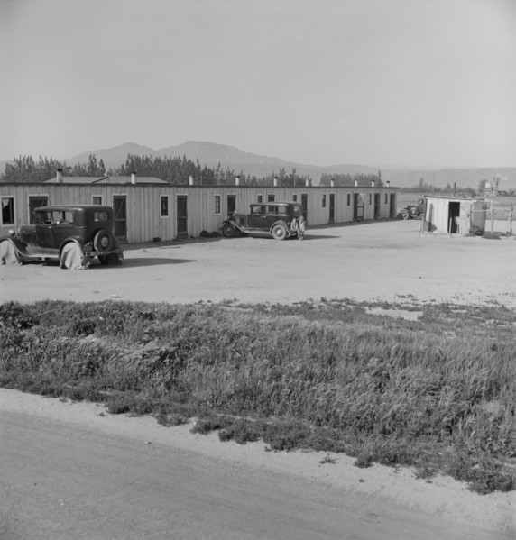 Arkansawyers auto camp...with Arkansas migrants, Greenfield, Salinas Valley, CA, 1939. Creator: Dorothea Lange.