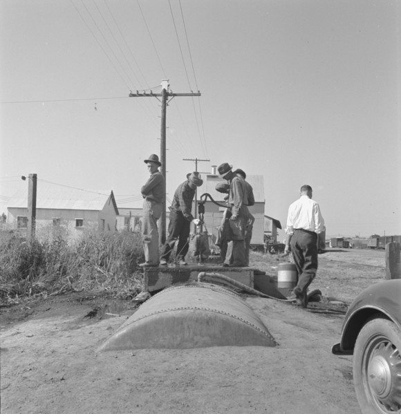 Town pump of Tulelake at railroad yard, Tulelake, Siskiyou County, California, 1939. Creator: Dorothea Lange.