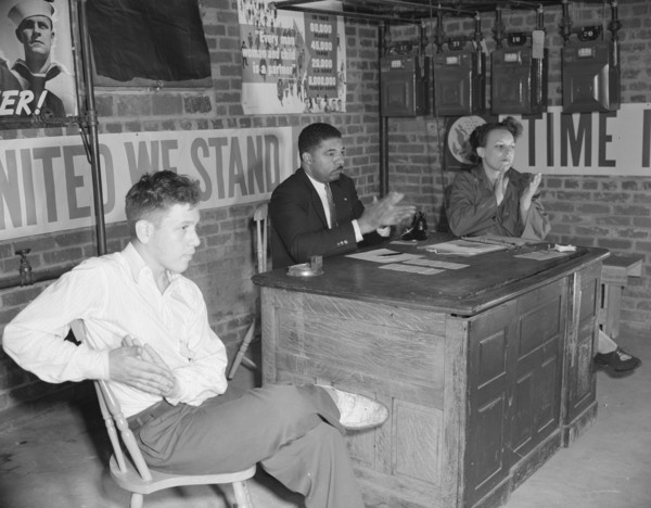 Air raid wardens' meeting in zone nine, Southwest area, Washington, D.C, 1942. Creator: Gordon Parks.