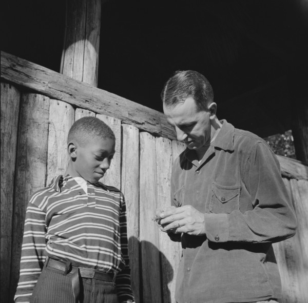 Mr. Lewis Traver, the director, with camper at Camp Nathan Hale, Southfields, New York, 1943 Creator: Gordon Parks.