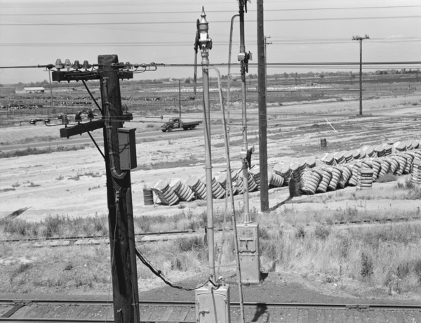 From the overpass approaching Fresno, between Tulare and Fresno, California, 1939. Creator: Dorothea Lange.