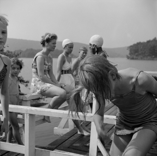 Sun bathing on Lake Tiorati, Camp Christmas Seals, Haverstraw, New York, 1943. Creator: Gordon Parks.