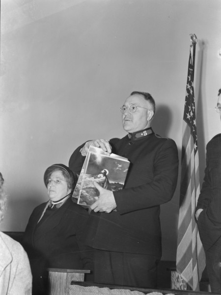 Selling Easter edition of the "War Cry", Salvation army, San Francisco, California, 1939. Creator: Dorothea Lange.