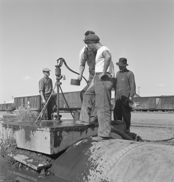 Drinking water for the whole town..., Tulelake, Siskiyou County, California, 1939. Creator: Dorothea Lange.