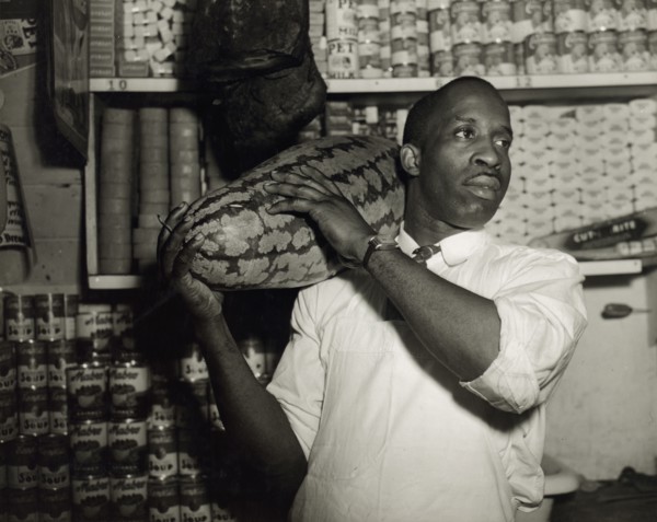Mr. J. Benjamin, owner of the grocery store patronized by Mrs. Ella Watson..., Washington, DC, 1942. Creator: Gordon Parks.