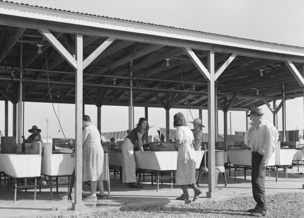 Laundry facilities for migratory workers in FSA camp at Westley, California, 1939. Creator: Dorothea Lange.