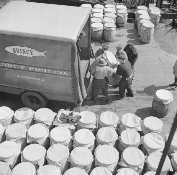 Barrels of fish on the docks at Fulton fish market ready to be shipped to retailers, New York, 1943. Creator: Gordon Parks.