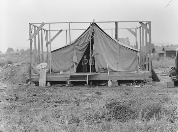 Family living in tent while building the house..., near Klamath Falls, Klamath County, Oregon, 1939. Creator: Dorothea Lange.