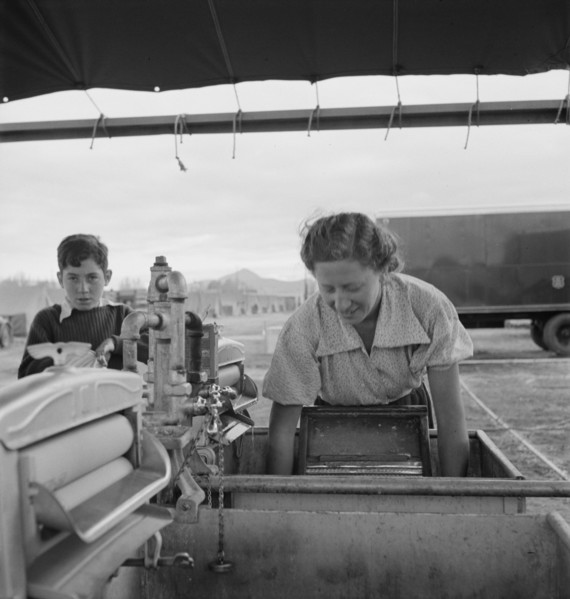 Portable laundry unit, shower unit beyond, FSA camp, Merrill, Oregon, 1939. Creator: Dorothea Lange.