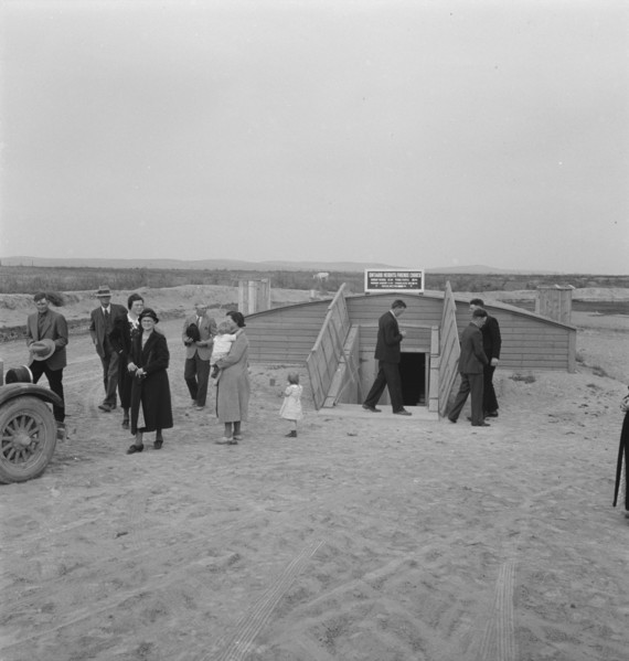 Congregation leaving after services. Preacher in doorway. Dead Ox Flat, Malheur County, Oregon.