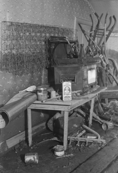 Interior of a farmhouse near Ridgeley, Tennessee, after the 1937 flood waters had subsided.