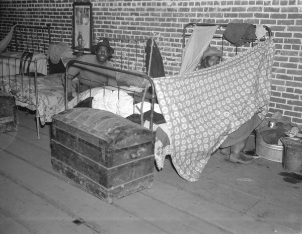 Negro flood refugees in the Red Cross temporary infirmary at Forrest City, Arkansas.