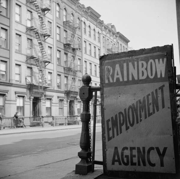 New York, New York. One of the numerous employment agency signs in the Harlem area.