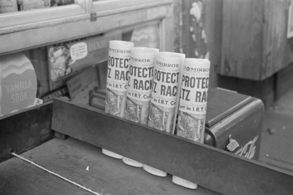 New York, New York. 61st Street between 1st and 3rd Avenues. Newspapers for sale.