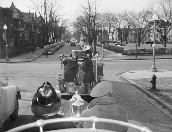 Firehouse station number four. Washington, D.C. Engines returning from a fire.