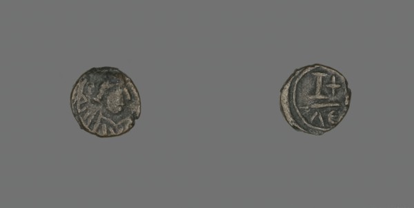 12 Nummi (Coin) of a Byzantine Emperor, Roman Period, 6th century CE.