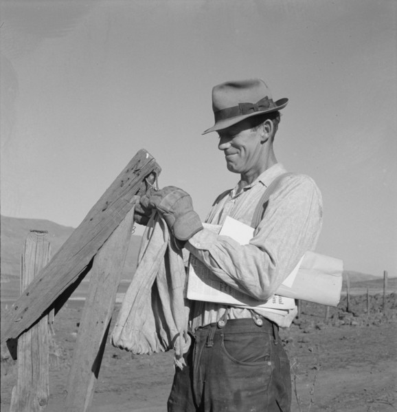 Farmer getting the morning mail. Gem County, Idaho.
