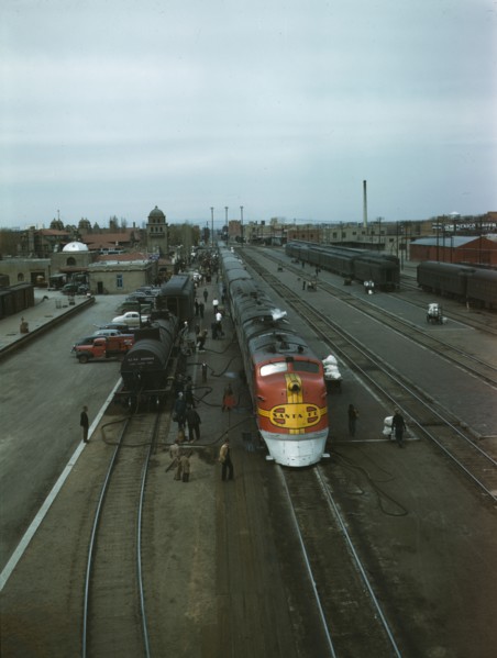 Santa Fe R.R. streamliner, the "super Chief," being serviced..., Albuquerque, N.Mexico , 1943. Creator: Jack Delano.