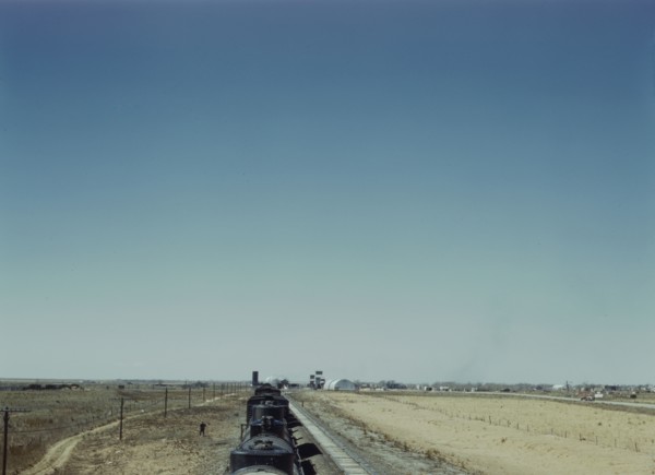 Westbound freight train stopping for water, Melrose, New Mexico, 1943. Creator: Jack Delano.