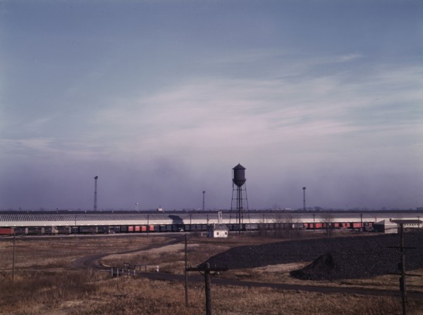 Truck trailers loading and unloading at C & NW RR's Proviso yard, Chicago, Ill., 1942. Creator: Jack Delano.