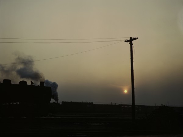 View in a departure yard at C & NW RR's Proviso (?) yard at twilight, Chicago, Ill., 1942. Creator: Jack Delano.