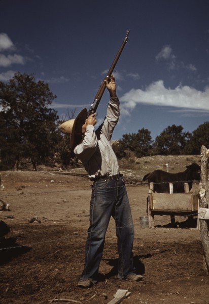 Mr. Leatherman, homesteader, shooting hawks..., Pie Town, New Mexico, 1940. Creator: Russell Lee.
