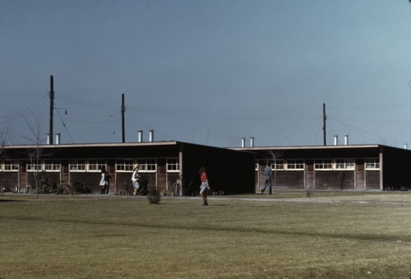 Row shelters, FSA ... labor camp, Robstown, Tex., 1942. Creator: Arthur Rothstein.