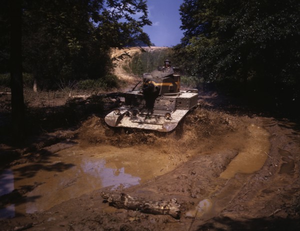 Light tank going through water obstacle, Ft. Knox, Ky., 1942. Creator: Alfred T Palmer.