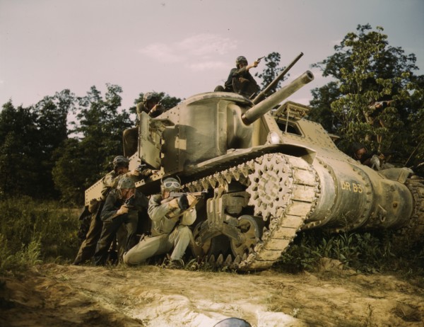 M-3 tank and crew using small arms, Ft. Knox, Ky., 1942. Creator: Alfred T Palmer.