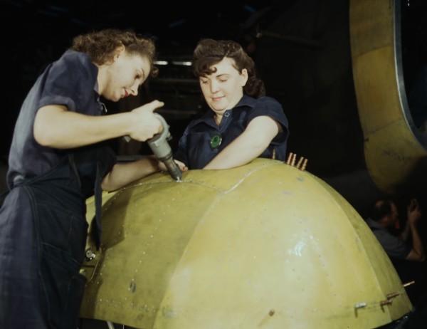 Working on a "Vengeance" dive bomber, Vultee [Aircraft Inc.], Nashville, Tennessee, 1943. Creator: Alfred T Palmer.